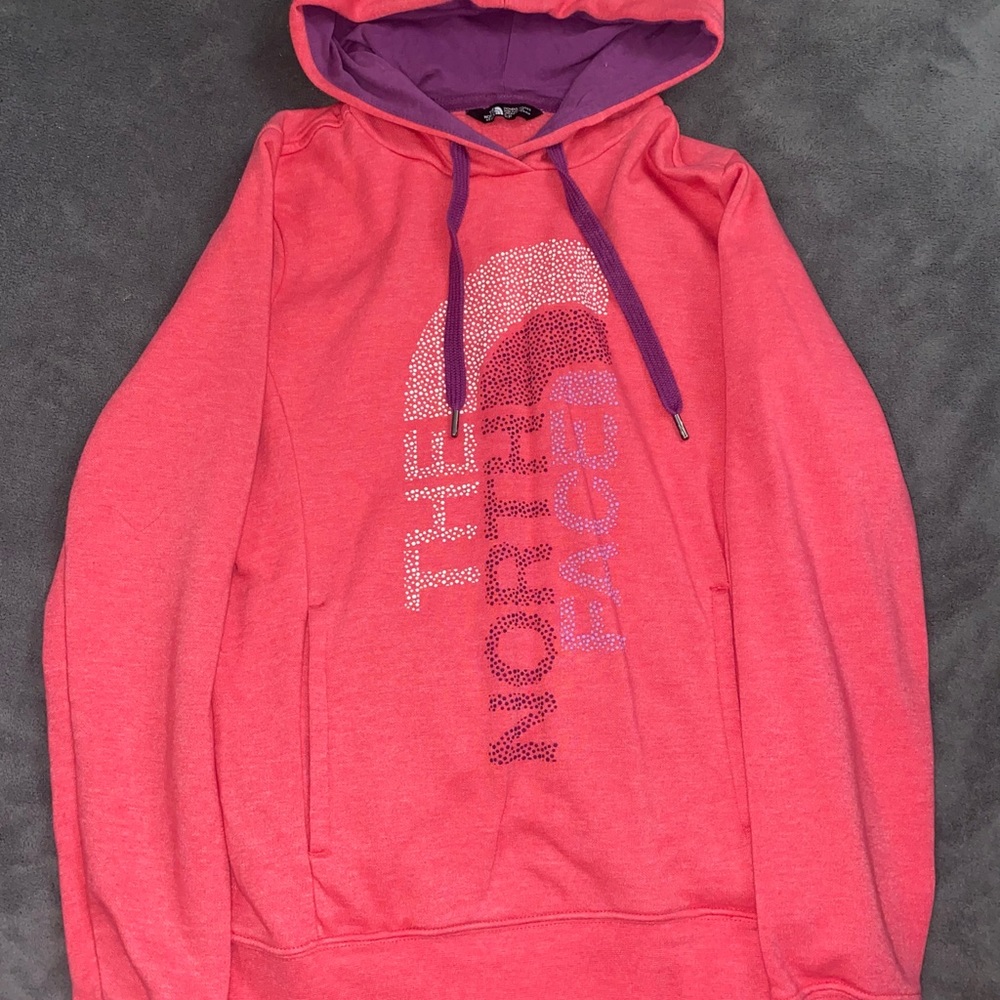 The North Face pink colored hoodie.